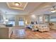 Spacious bedroom features terra cotta tile floor and two seating areas at 284 North St, Palm Harbor, FL 34683