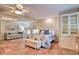 Spacious bedroom features terra cotta tile floor and two seating areas at 284 North St, Palm Harbor, FL 34683