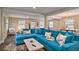 Open-concept living room featuring a comfortable seating area with large sectional sofa at 284 North St, Palm Harbor, FL 34683