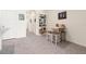 Bright dining area with tile floors, bookshelf, and seating at 2925 Evergreen Elm Pass, Wesley Chapel, FL 33543