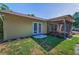 Backyard view of the home, landscaping, and outdoor living space at 3041 Oak View Dr, Palm Harbor, FL 34684