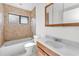 Bathroom featuring tile flooring, tub, shower, and wood vanity at 3041 Oak View Dr, Palm Harbor, FL 34684