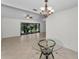 Open floor plan with dining area table and view of the screened in porch at 3041 Oak View Dr, Palm Harbor, FL 34684