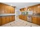 Bright eat-in kitchen with stainless steel appliances and generous cabinet space at 3041 Oak View Dr, Palm Harbor, FL 34684