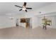 Spacious living and dining area with tiled floors and natural light at 3041 Oak View Dr, Palm Harbor, FL 34684