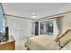 Bedroom with sliding glass doors and a ceiling fan at 3207 Hilltop Ln, Largo, FL 33770