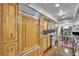 Spacious kitchen featuring stainless steel appliances and custom wood cabinets at 3207 Hilltop Ln, Largo, FL 33770