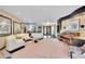 Expansive living room showcases elegant decor, plush seating, and stylish accents, perfect for entertaining at 3207 Hilltop Ln, Largo, FL 33770