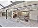 Spacious covered outdoor patio area perfect for dining and relaxing, with easy access to indoor spaces at 3207 Hilltop Ln, Largo, FL 33770
