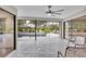 Covered patio looking out at the gorgeous pool and lush landscaping at 3207 Hilltop Ln, Largo, FL 33770