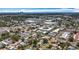 Aerial view showcasing the neighborhood's proximity to commercial areas and a distant city skyline at 3271 36Th N St, St Petersburg, FL 33713
