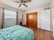 Comfortable bedroom with hardwood floors, natural light, and a spacious closet at 3271 36Th N St, St Petersburg, FL 33713