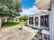 Outdoor patio area with brick pavers, perfect for entertaining or relaxing with a view of the backyard at 3271 36Th N St, St Petersburg, FL 33713