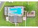 Overhead aerial view of community pool, playground, and clubhouse amenities at 36312 Garden Wall Way, Zephyrhills, FL 33541