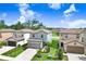 Aerial view of neighborhood featuring two-story homes with landscaping, and well maintained lawns at 36312 Garden Wall Way, Zephyrhills, FL 33541