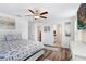 Spacious main bedroom with ensuite bathroom and ample closet space at 36312 Garden Wall Way, Zephyrhills, FL 33541