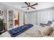 Bedroom featuring built-in storage, a closet and a connecting bathroom at 4806 Country Hills Dr, Tampa, FL 33624