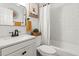 Bright bathroom with subway tile in the shower and modern fixtures at 512 Flame Tree Dr, Apollo Beach, FL 33572