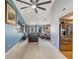 Bright, open living space featuring a kitchen, dining area, and comfortable seating at 5540 Applegate Dr, Spring Hill, FL 34606