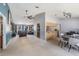 Expansive open-concept layout connecting living room, kitchen, and dining spaces at 5540 Applegate Dr, Spring Hill, FL 34606