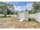 The property includes a new storage shed sitting behind a privacy fence at 5540 Applegate Dr, Spring Hill, FL 34606