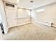 Upstairs bonus room showing neutral paint and carpet and offers an additional space for recreation at 6118 Voyagers Pl, Apollo Beach, FL 33572