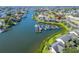 Waterfront condo community featuring a private boat dock and lush landscaping on a scenic canal at 644 Yardarm Dr # 22, Apollo Beach, FL 33572