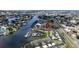 Breathtaking aerial view of the waterfront community showcasing the marina, and lush landscaping at 644 Yardarm Dr # 22, Apollo Beach, FL 33572