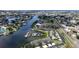 Waterfront condos on canal feature community boat dock, set against a backdrop of neighborhood and road at 644 Yardarm Dr # 22, Apollo Beach, FL 33572