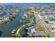 Aerial view of 644 Yardarm Dr condos near waterfront, boat docks, pool, and tennis court at 644 Yardarm Dr # 22, Apollo Beach, FL 33572