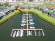 Gorgeous waterfront condos with private boat dock and well-manicured lawns create a serene living environment at 644 Yardarm Dr # 22, Apollo Beach, FL 33572