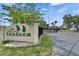 Gated community entrance with manicured landscaping at 644 Yardarm Dr # 22, Apollo Beach, FL 33572