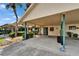 Inviting covered front entrance with lush landscaping and a well-maintained carport at 644 Yardarm Dr # 22, Apollo Beach, FL 33572
