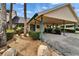 Inviting covered front entrance with lush landscaping and a well-maintained carport at 644 Yardarm Dr # 22, Apollo Beach, FL 33572