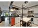 Bright kitchen featuring white cabinets, stainless appliances, and a marble island at 644 Yardarm Dr # 22, Apollo Beach, FL 33572