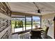 Relaxing lanai with comfortable seating and serene views of the waterfront and boat docks at 644 Yardarm Dr # 22, Apollo Beach, FL 33572
