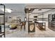 Open-concept living space with adjacent kitchen featuring modern furnishings and decor at 644 Yardarm Dr # 22, Apollo Beach, FL 33572
