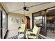 Relaxing patio space with cozy seating, string lights, ceiling fan and views of boat docks at 644 Yardarm Dr # 22, Apollo Beach, FL 33572