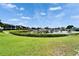 Scenic waterfront with boat docks surrounded by lush greenery at 644 Yardarm Dr # 22, Apollo Beach, FL 33572