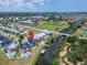 Beautiful aerial view of the property close to the water and nearby school at 6520 Simone Shores Cir, Apollo Beach, FL 33572