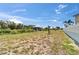 Spacious backyard with a covered boat dock at 6520 Simone Shores Cir, Apollo Beach, FL 33572