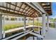 View of the boat lift located inside the covered boat dock at 6520 Simone Shores Cir, Apollo Beach, FL 33572