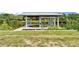 View of a dock and canal at 6520 Simone Shores Cir, Apollo Beach, FL 33572