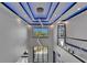 Elegant foyer boasting soaring ceilings, a modern chandelier, and an abundance of natural light at 6520 Simone Shores Cir, Apollo Beach, FL 33572