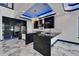 Modern kitchen featuring sleek cabinetry, stainless steel appliances, and a stylish central island at 6520 Simone Shores Cir, Apollo Beach, FL 33572