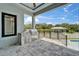 Outdoor kitchen with a sink and grill, perfect for entertaining at 6520 Simone Shores Cir, Apollo Beach, FL 33572