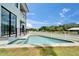 Beautiful backyard pool and spa, perfect for relaxation and outdoor entertaining on sunny days at 6520 Simone Shores Cir, Apollo Beach, FL 33572