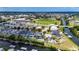 Aerial view of luxury waterfront community, showcasing access to canals, bay, and nearby amenities at 6526 Simone Shores Cir, Apollo Beach, FL 33572