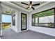 This balcony has ample space and features a ceiling fan for comfort and neighborhood views at 6526 Simone Shores Cir, Apollo Beach, FL 33572