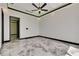 Empty room has nice flooring and big windows at 6526 Simone Shores Cir, Apollo Beach, FL 33572